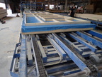 Bau-Tech Montagetisch inkl. Längsförderung und Querförderung, Fertigungsmaße: ca. 10 x 3 m, mit Kettenförderung Bau-Tech Montagetisch inkl. Längsförderung und Querförderung, Fertigungsmaße: ca. 10 x 3 m, mit Kettenförderung