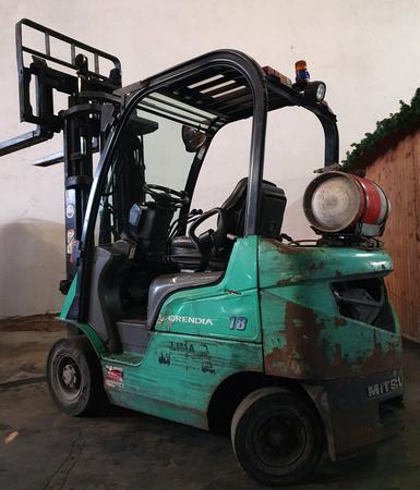 Mitsubishi FG18N Gasbetriebener Stapler / Seriennummer: EF34L-40438, Baujahr: 2007, Betriebsstunden: 16.789, Hubhhe: 4,750 m, Tragfhigkeit: 1.750 kg, Freihubstapler, Hubgerst: 3 hydraulische Steuerkreise, Geschwindigkeit: max. 20 km/h, Eigengewicht: 2.